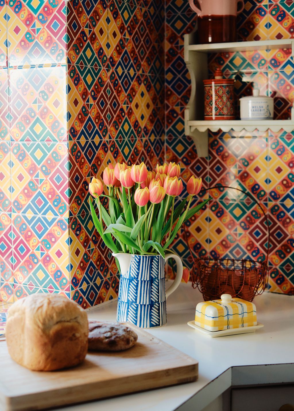 Image may contain Indoors Interior Design Bread Food Pottery Furniture Table Tabletop Cup Flower and Plant