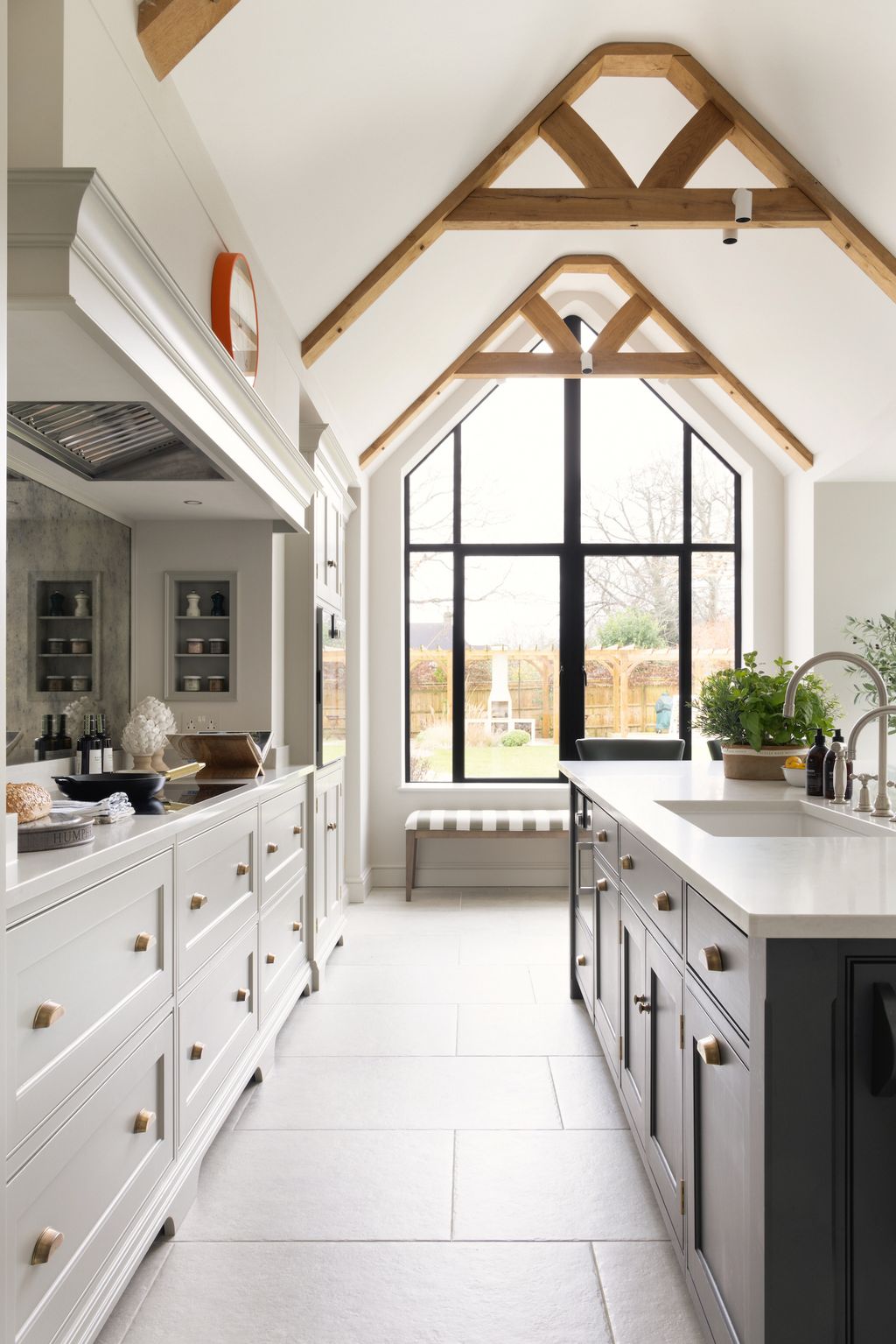 Image may contain Indoors Interior Design Sink Plant Kitchen Floor Bench Furniture Sink Faucet Bread and Food