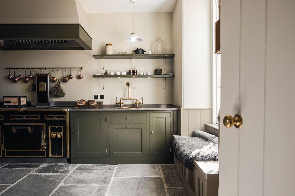 Image may contain Indoors Interior Design Floor Kitchen Flooring Home Decor Sink and Sink Faucet