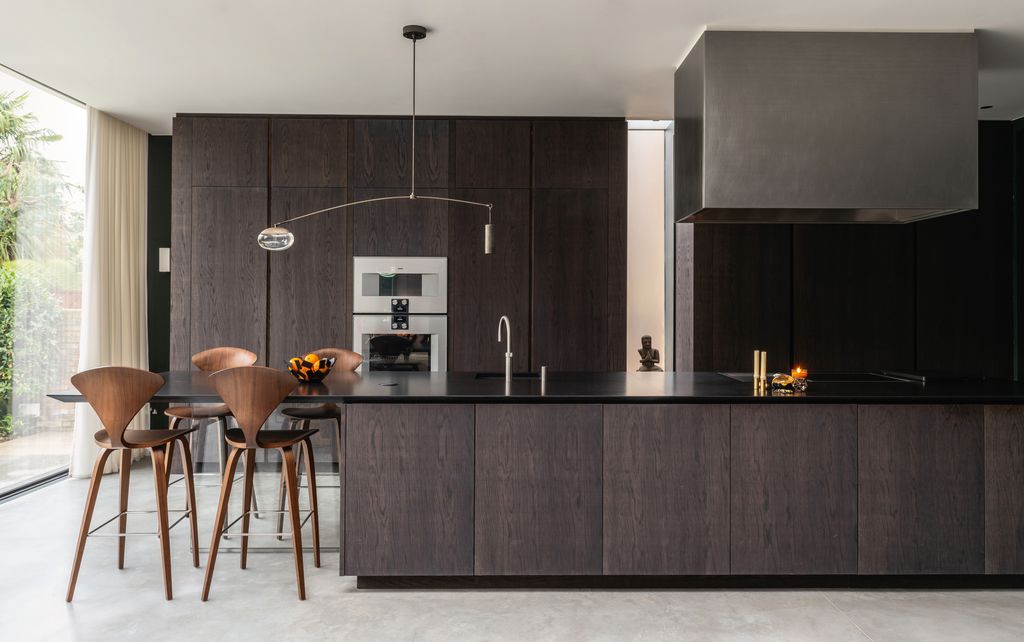Image may contain Indoors Interior Design Kitchen Dining Table Furniture Table Kitchen Island and Architecture