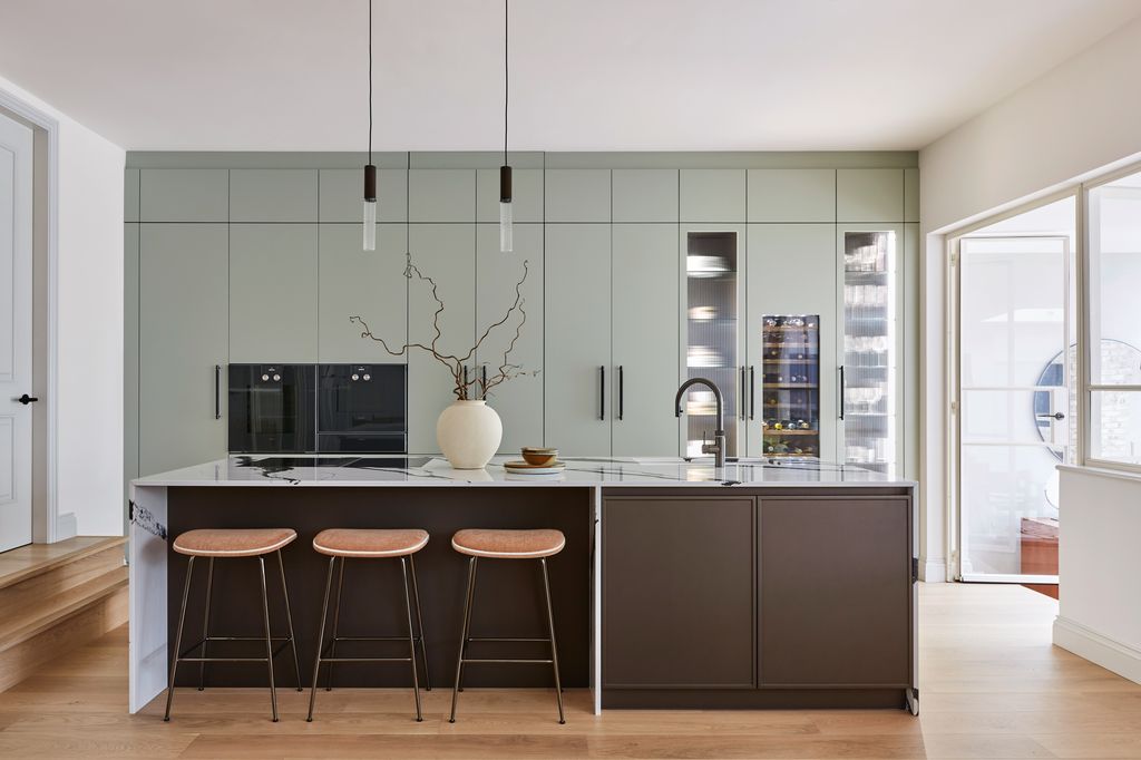 Image may contain Indoors Interior Design Kitchen Kitchen Island and Furniture