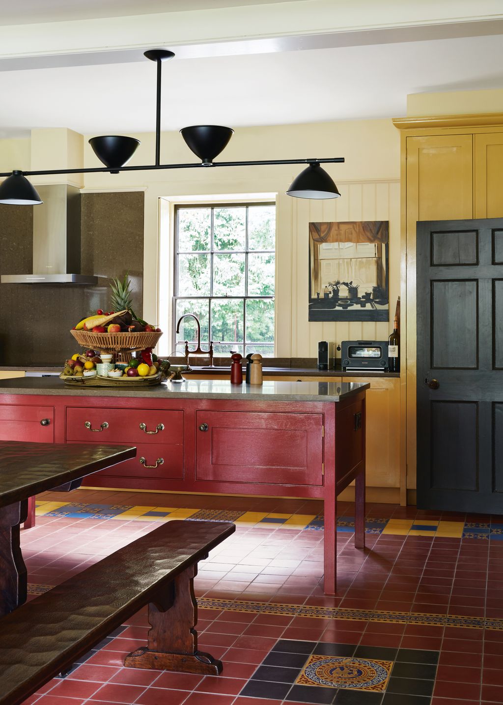 Image may contain Indoors Interior Design Kitchen Floor Flooring Sink Sink Faucet Kitchen Island and Appliance
