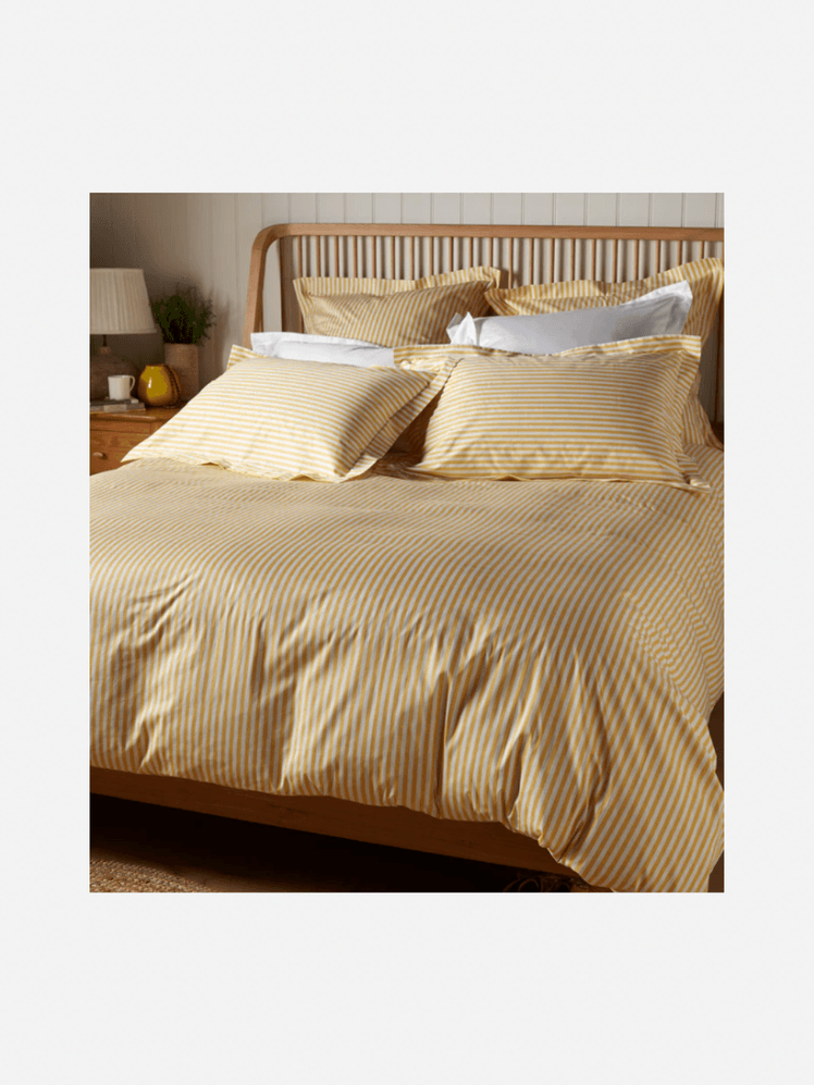 Image may contain: Cushion, Home Decor, Furniture, Bed, Indoors, Interior Design, Linen, Pillow, and Bed Sheet