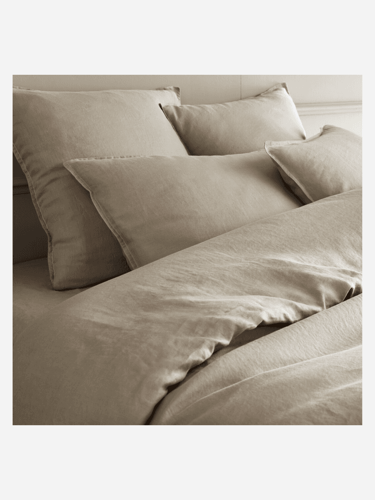 Image may contain: Cushion, Home Decor, Linen, Pillow, Bed, and Furniture