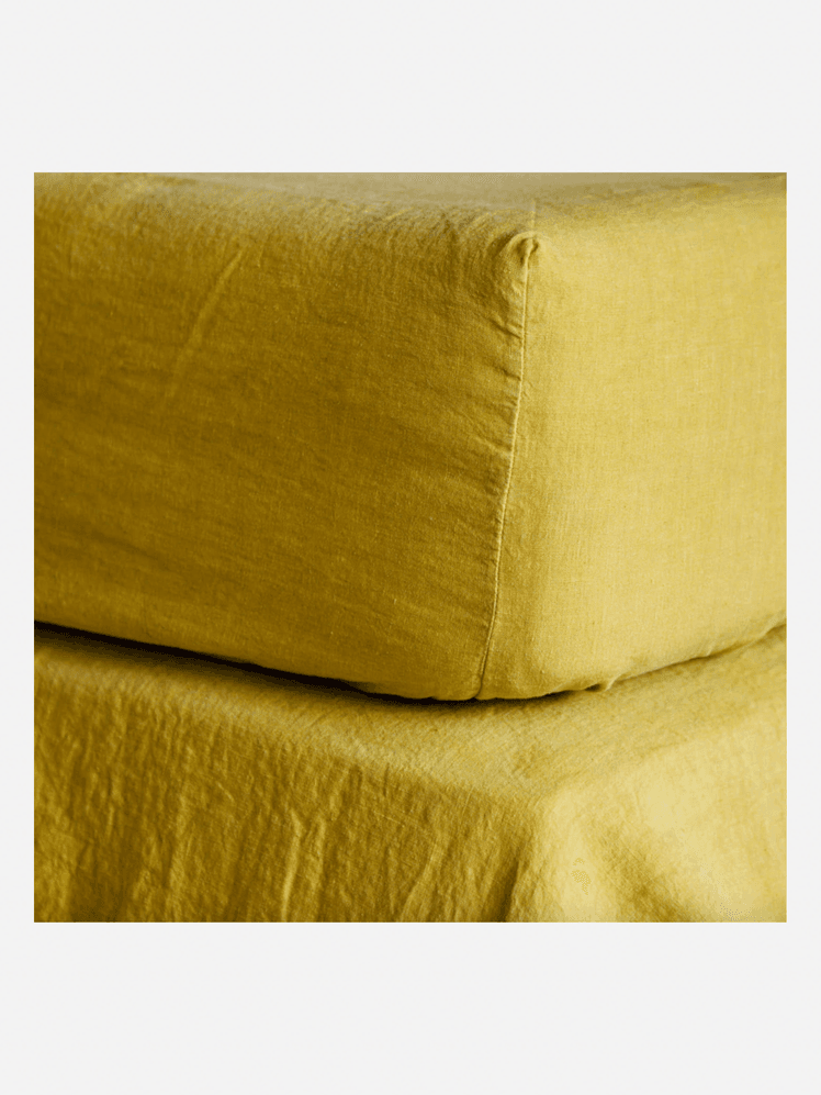 Image may contain: Cushion, Home Decor, Linen, Couch, Furniture, and Pillow