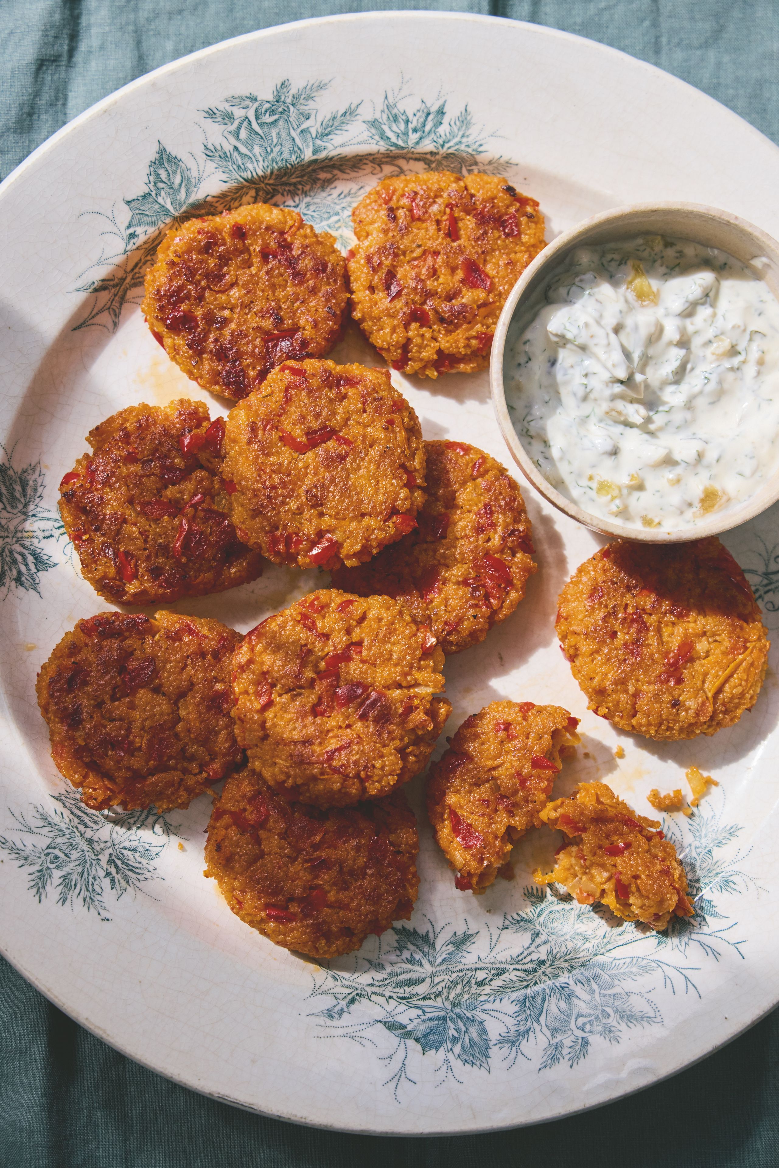 Image may contain Plate Food Fritters Bread and Cutlet