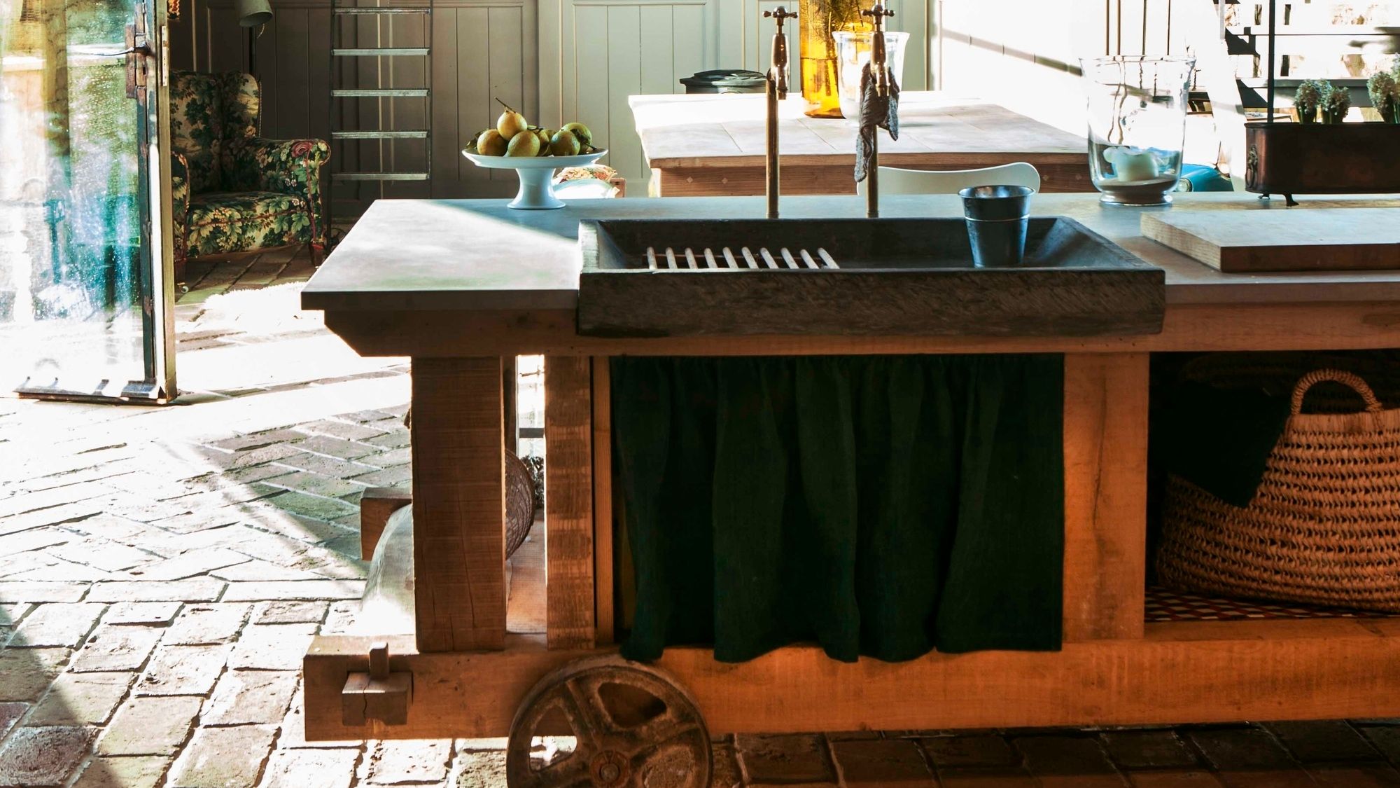 Image may contain: Sink, Sink Faucet, Accessories, Bag, Handbag, Cup, Wood, Indoors, Kitchen, Chair, and Furniture