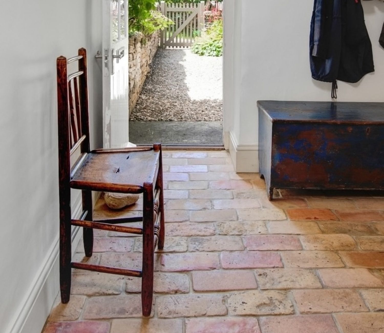 Image may contain: Floor, Flooring, Path, Walkway, Wood, Chair, and Furniture