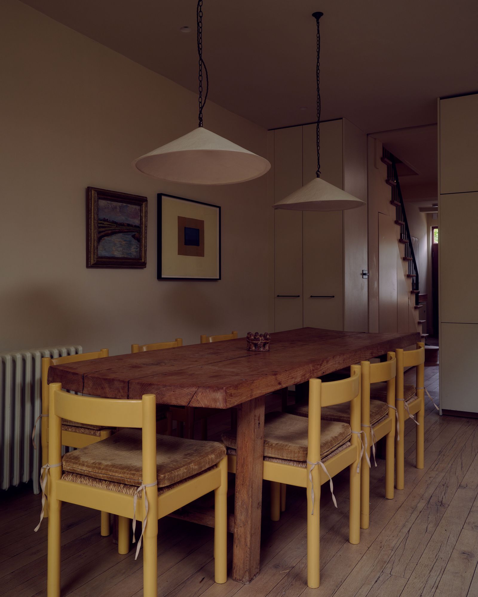 Image may contain Architecture Building Dining Room Dining Table Furniture Indoors Room Table and Wood