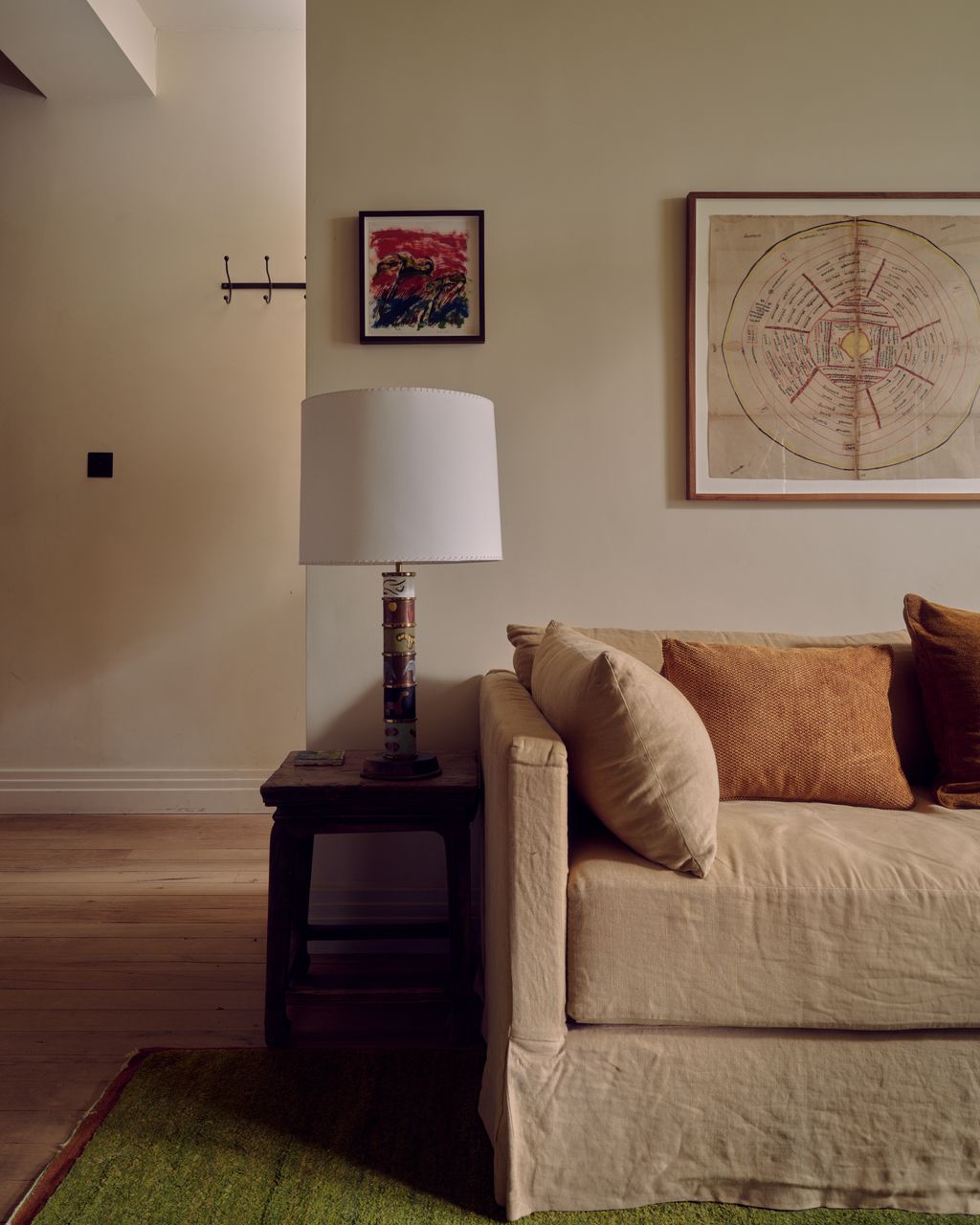 Image may contain Lamp Cushion Home Decor Couch Furniture Art Painting Architecture Building and Indoors