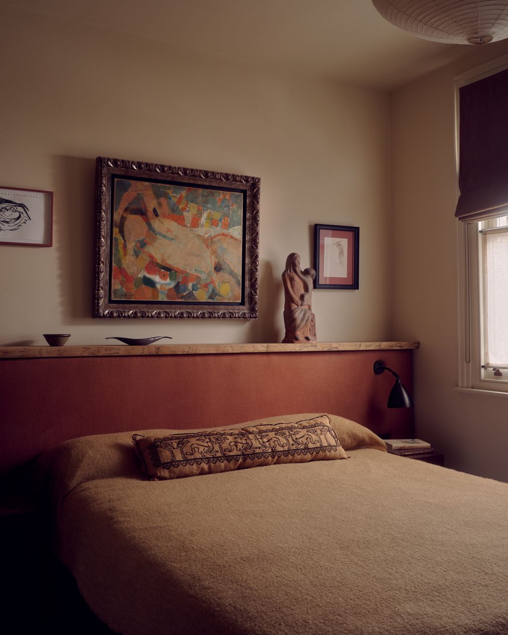 Image may contain Indoors Interior Design Art Painting Furniture Bed Lamp Bedroom Room Book and Publication