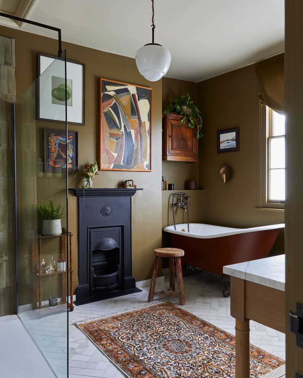 Image may contain Corner Home Decor Plant Lamp Rug Art Painting Bathing Bathtub Person Tub and Indoors