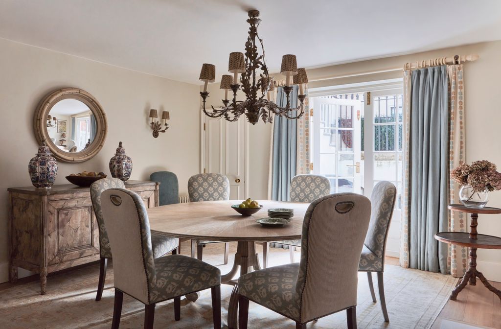 Image may contain Architecture Building Dining Room Dining Table Furniture Indoors Room Table Chandelier and Lamp