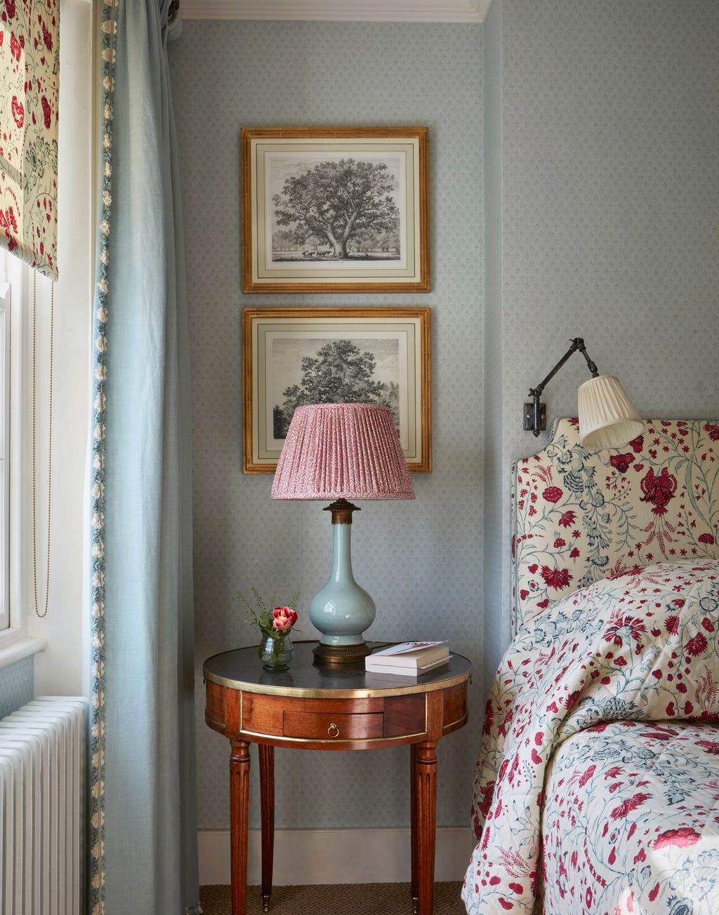 Image may contain Lamp Art Painting Desk Furniture Table Bed Book Publication Table Lamp Home Decor and Cushion