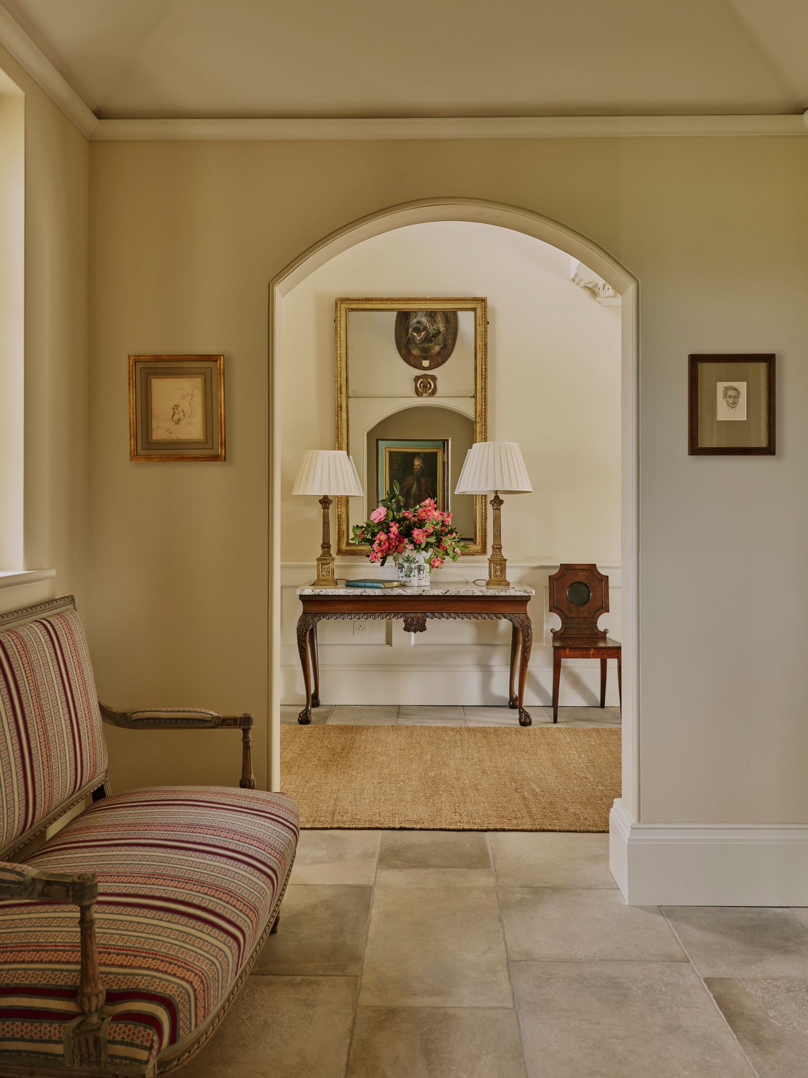 Image may contain Floor Lamp Flooring Architecture Building Furniture Indoors Living Room Room and Chair