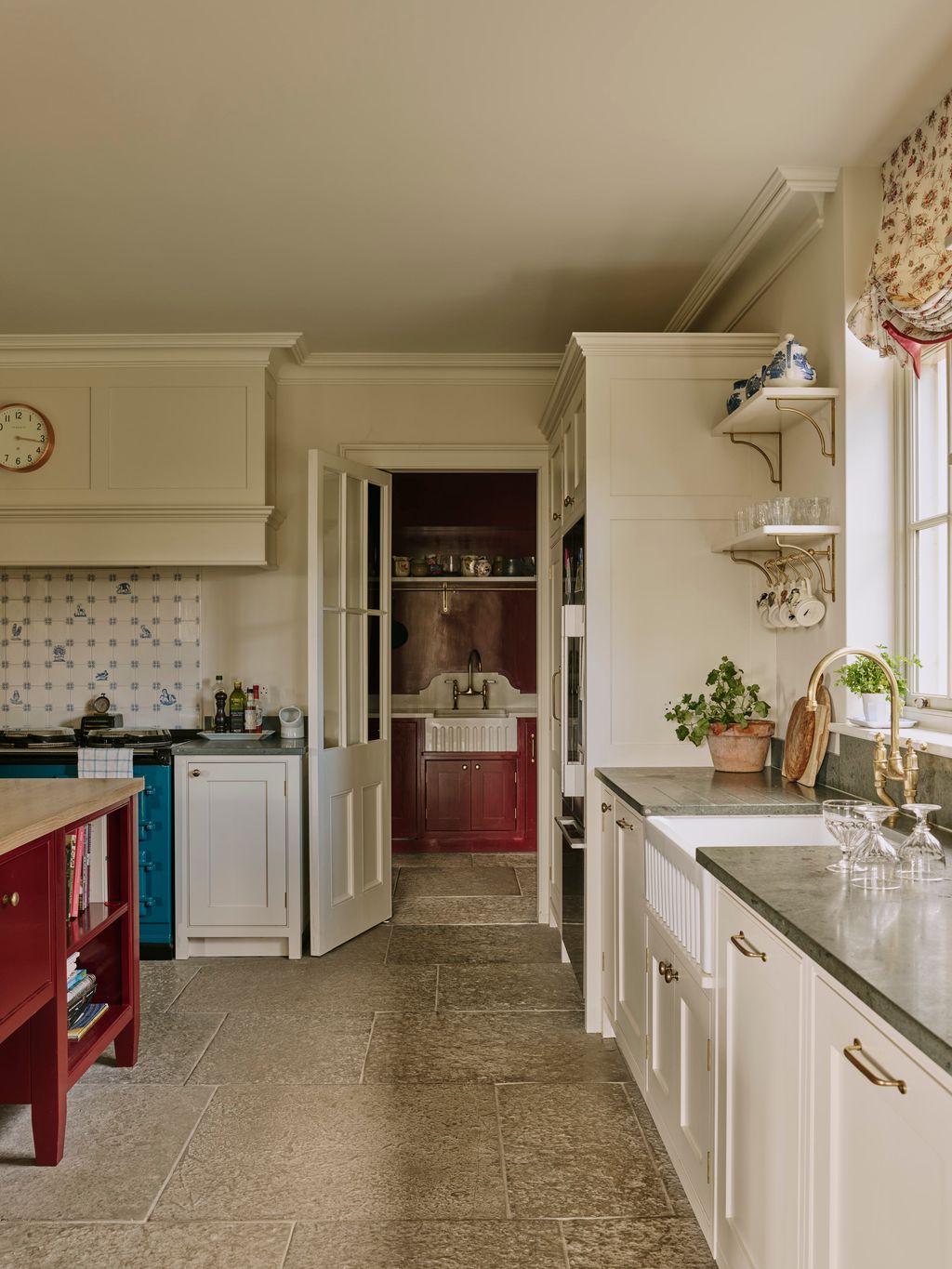 Image may contain Indoors Interior Design Floor Kitchen Plant Home Decor Rug Sink and Sink Faucet