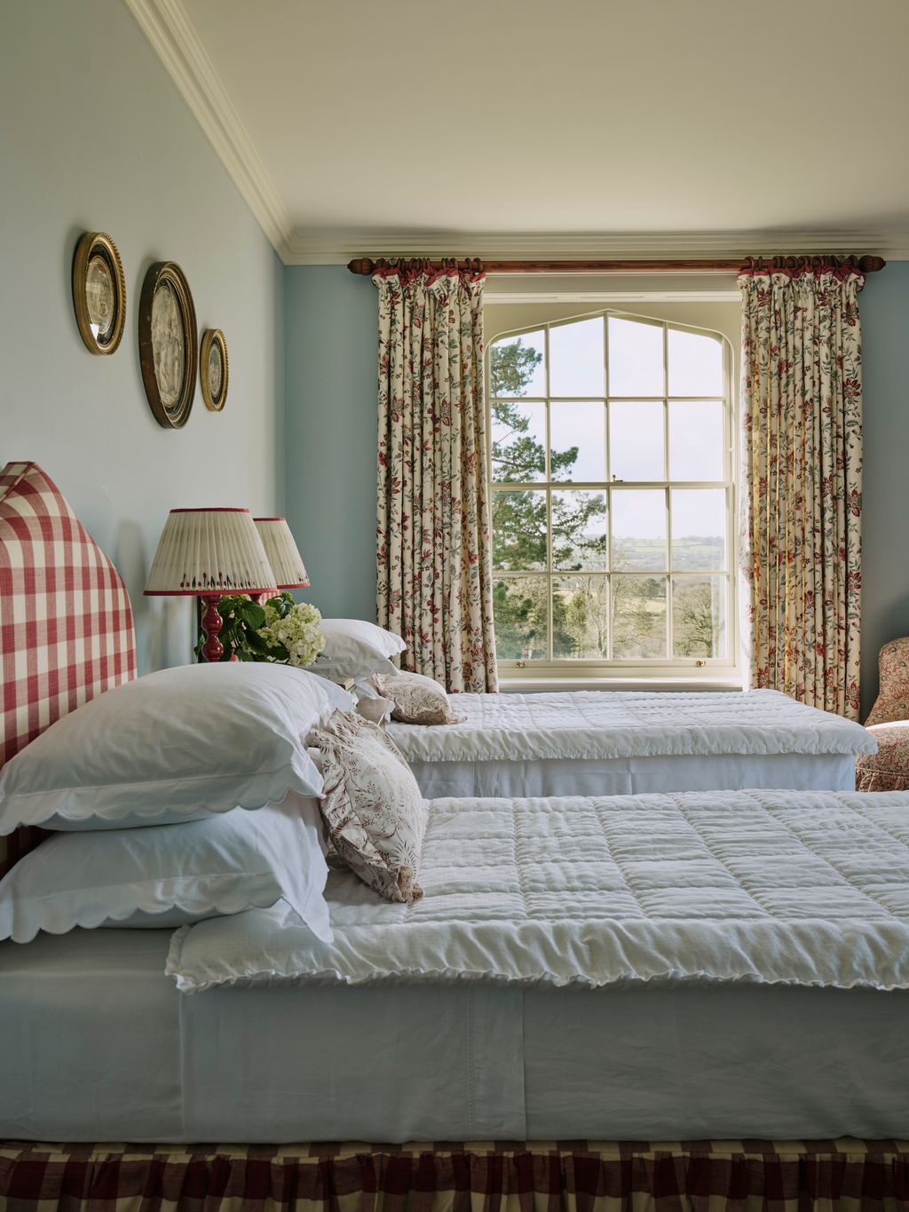 Image may contain Lamp Bed Furniture Cushion Home Decor Window Indoors Interior Design Art Painting and Bedroom