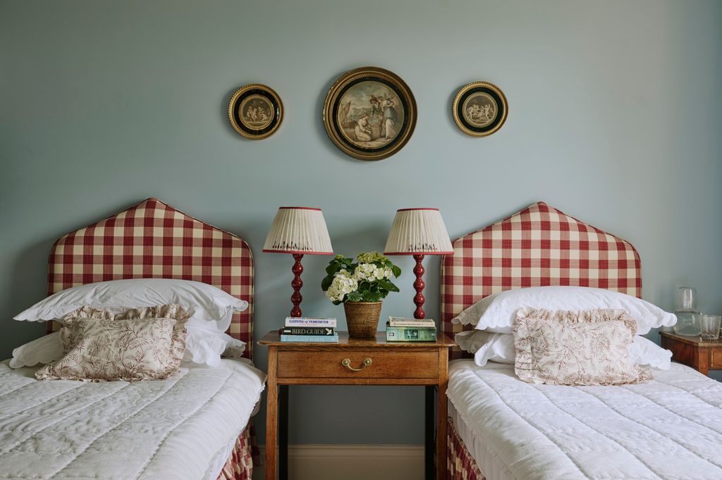 Image may contain Lamp Cushion Home Decor Bed Furniture Art Painting Bedroom Dorm Room Indoors Room and Cup