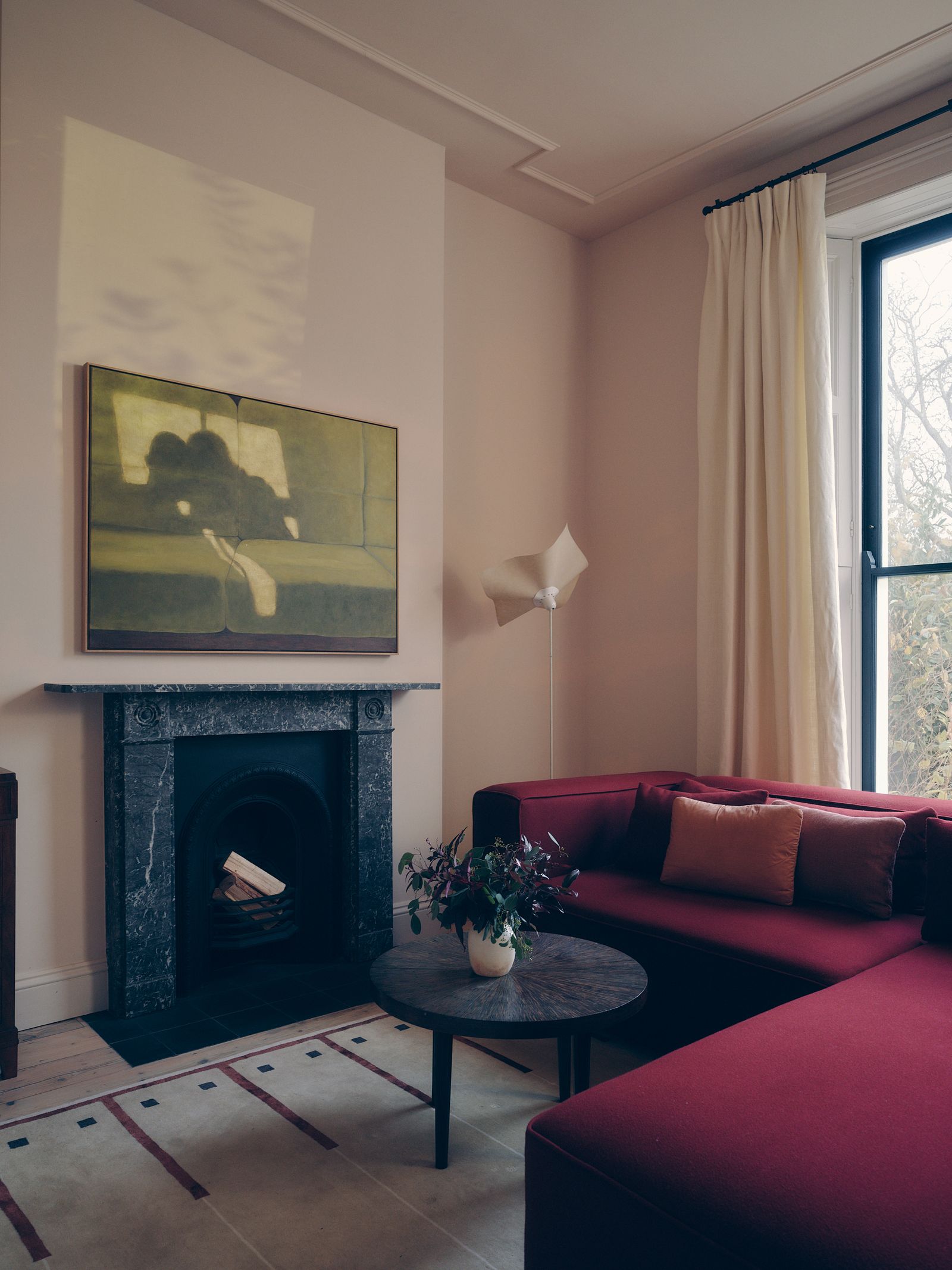 Image may contain Fireplace Indoors Architecture Building Furniture Living Room Room Interior Design and Art