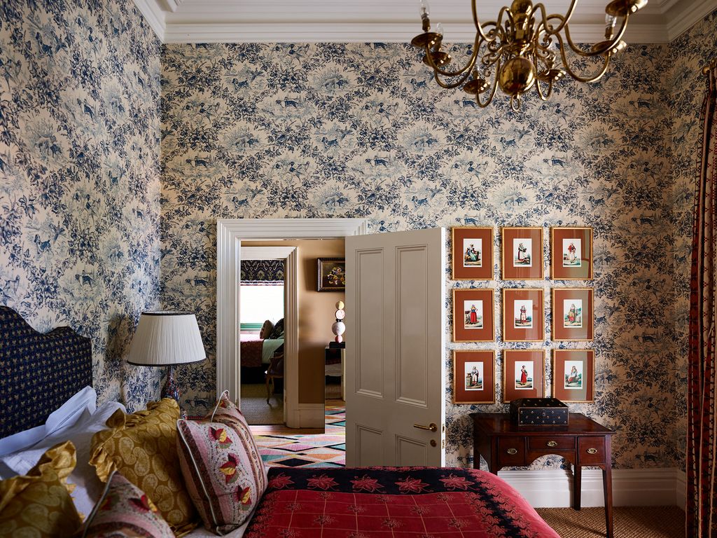 Image may contain Lamp Home Decor Art Painting Chandelier Bed Furniture Indoors Rug Cushion and Interior Design