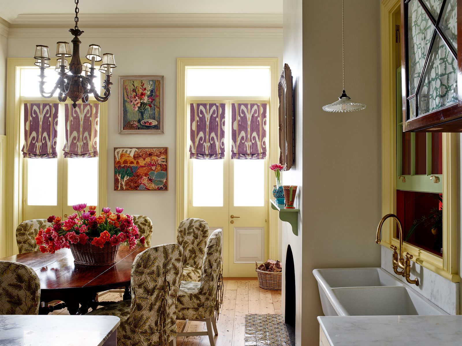 Image may contain Architecture Building Dining Room Dining Table Furniture Indoors Room Table Lamp and Chandelier