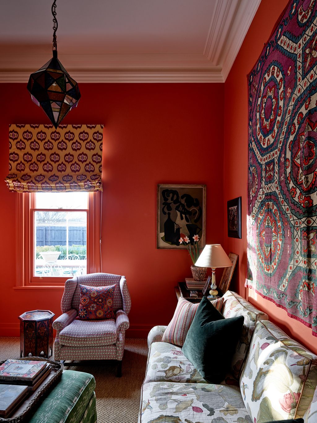 Image may contain Lamp Architecture Building Furniture Indoors Living Room Room Couch Home Decor Art and Painting