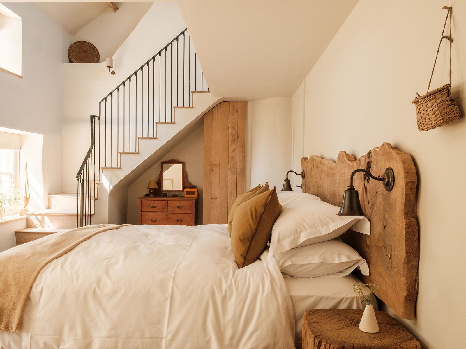 Image may contain Indoors Interior Design Lamp Architecture Building House Housing Staircase Home Decor and Bed