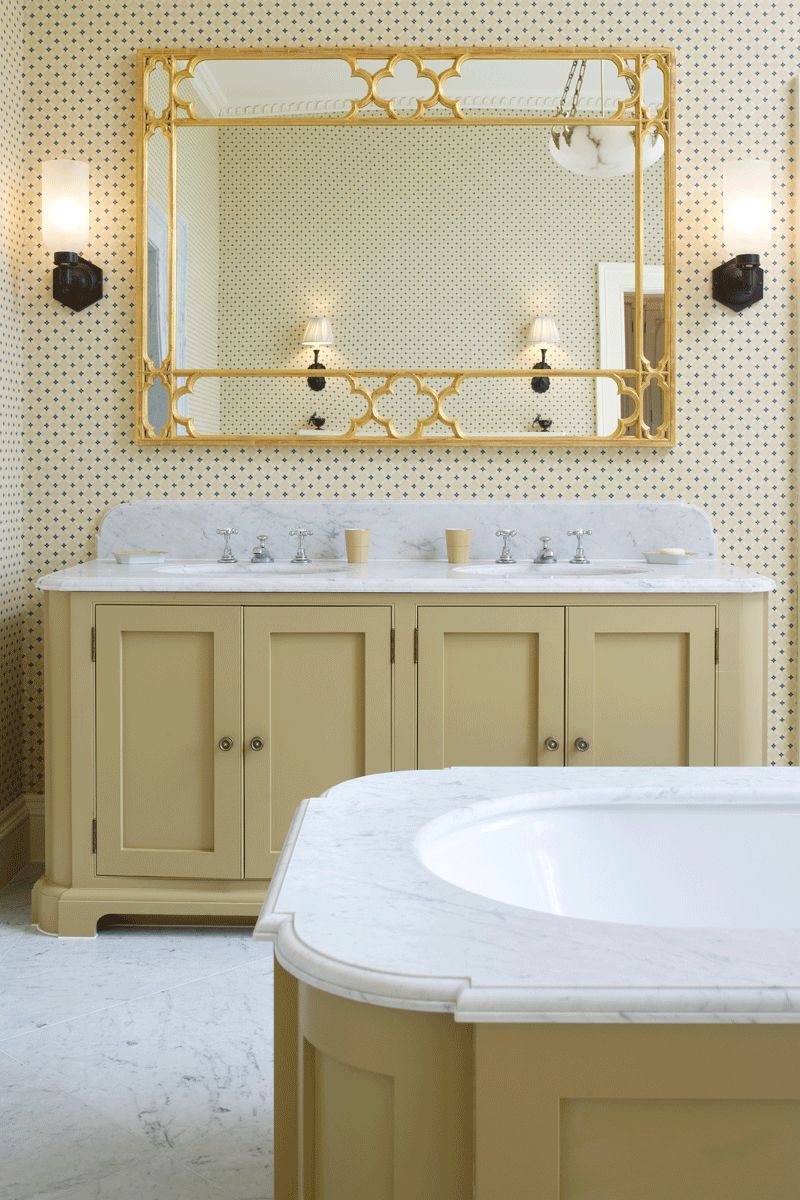 Image may contain Lamp Cup Sink Indoors Interior Design Sink Faucet Bathing Hot Tub and Tub