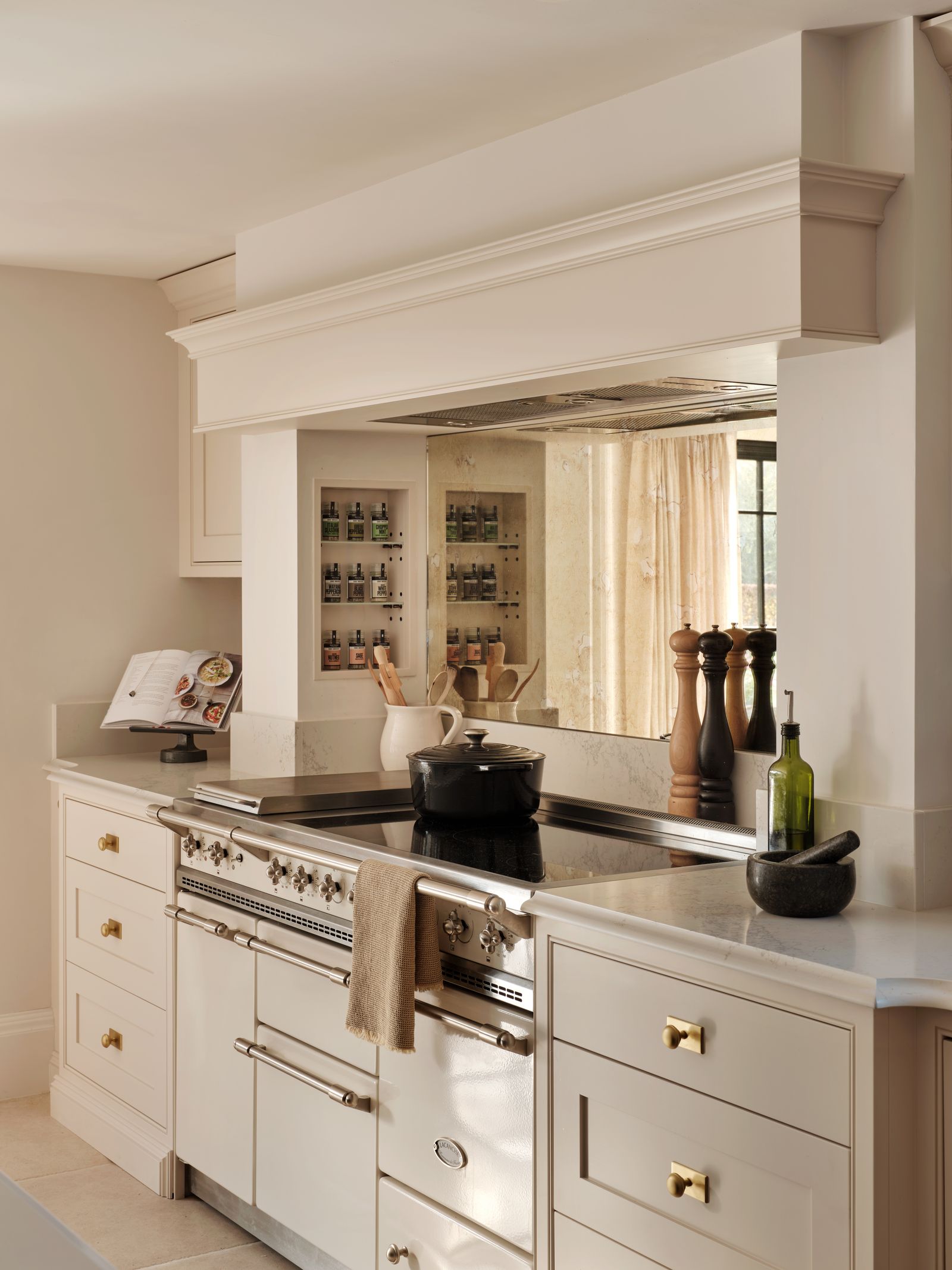 Image may contain Indoors Kitchen Interior Design Sink Sink Faucet Book and Publication