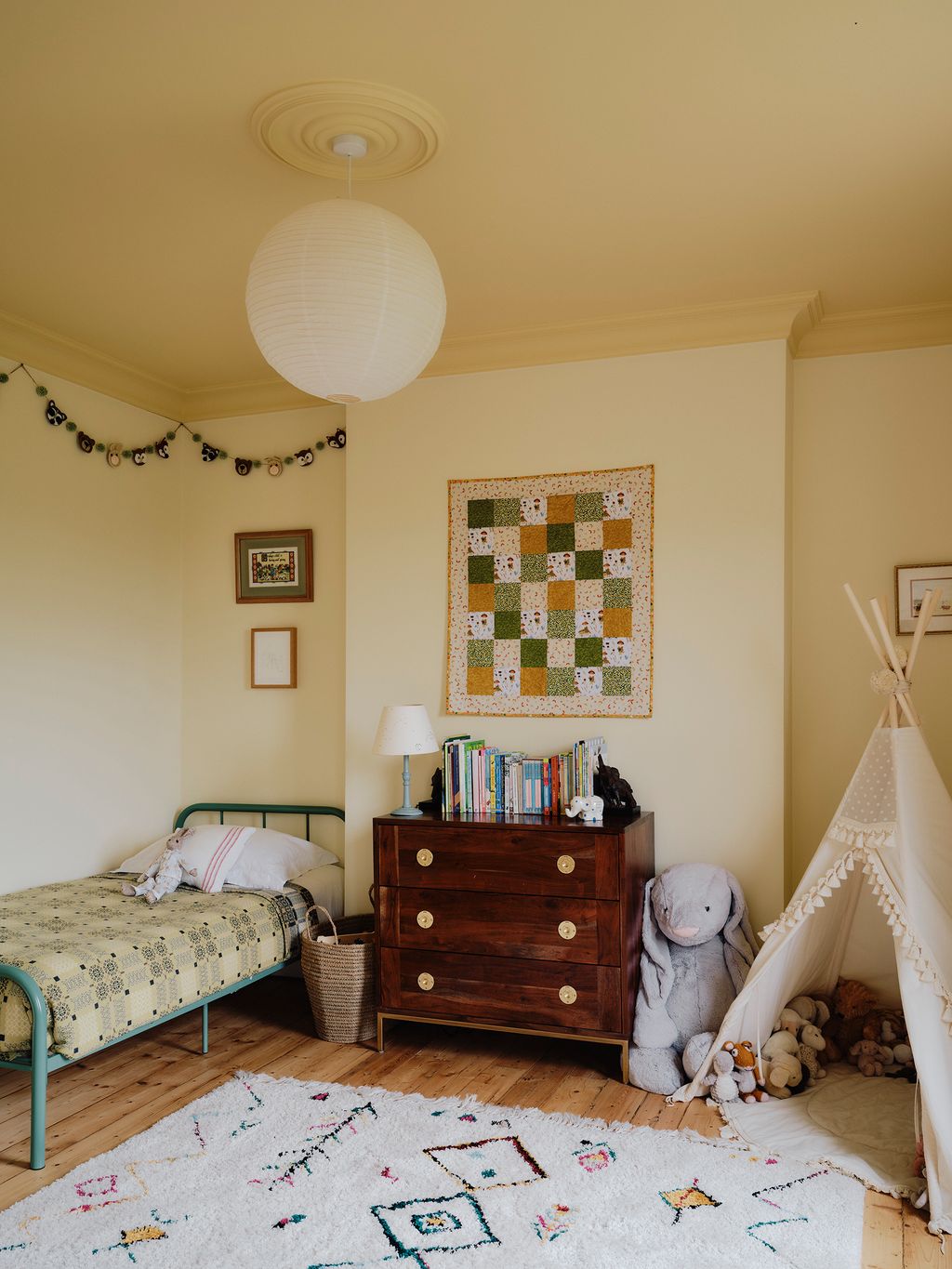 Image may contain Lamp Home Decor Bed Furniture Toy Rug Art Painting Indoors and Interior Design