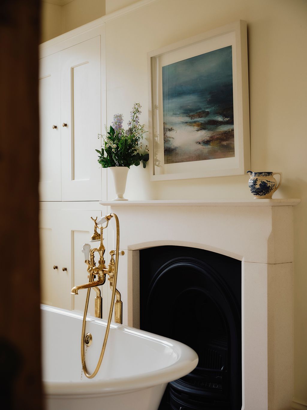 Image may contain Indoors Interior Design Art Painting Bathing Bathtub Person Tub Sink Sink Faucet and Plant