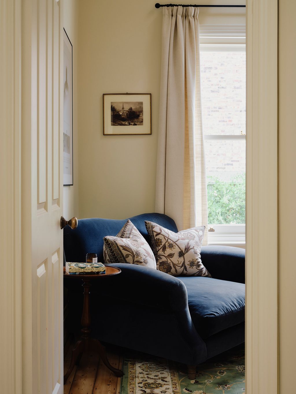 Image may contain Cushion Home Decor Couch Furniture Art Painting Rug Desk Table Indoors and Interior Design