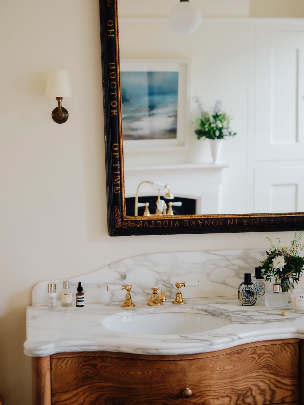 Image may contain Sink Lamp Sink Faucet and Cup