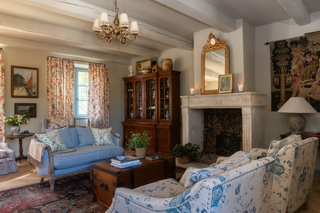 Image may contain Home Decor Lamp Plant Architecture Building Furniture Indoors Living Room Room Couch and Art