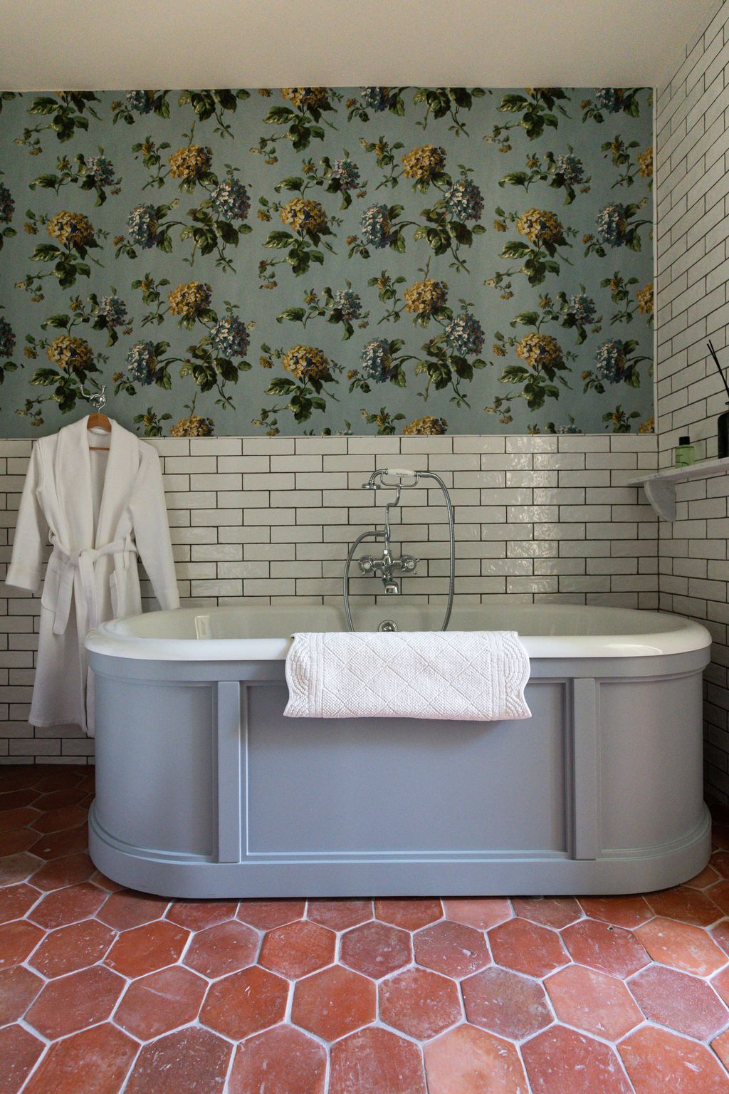 Image may contain Tub Bathing Bathtub Person Floor Indoors and Interior Design