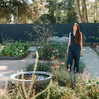 Image may contain: Adult, Person, Nature, Outdoors, Yard, Garden, Backyard, Boat, Transportation, and Vehicle