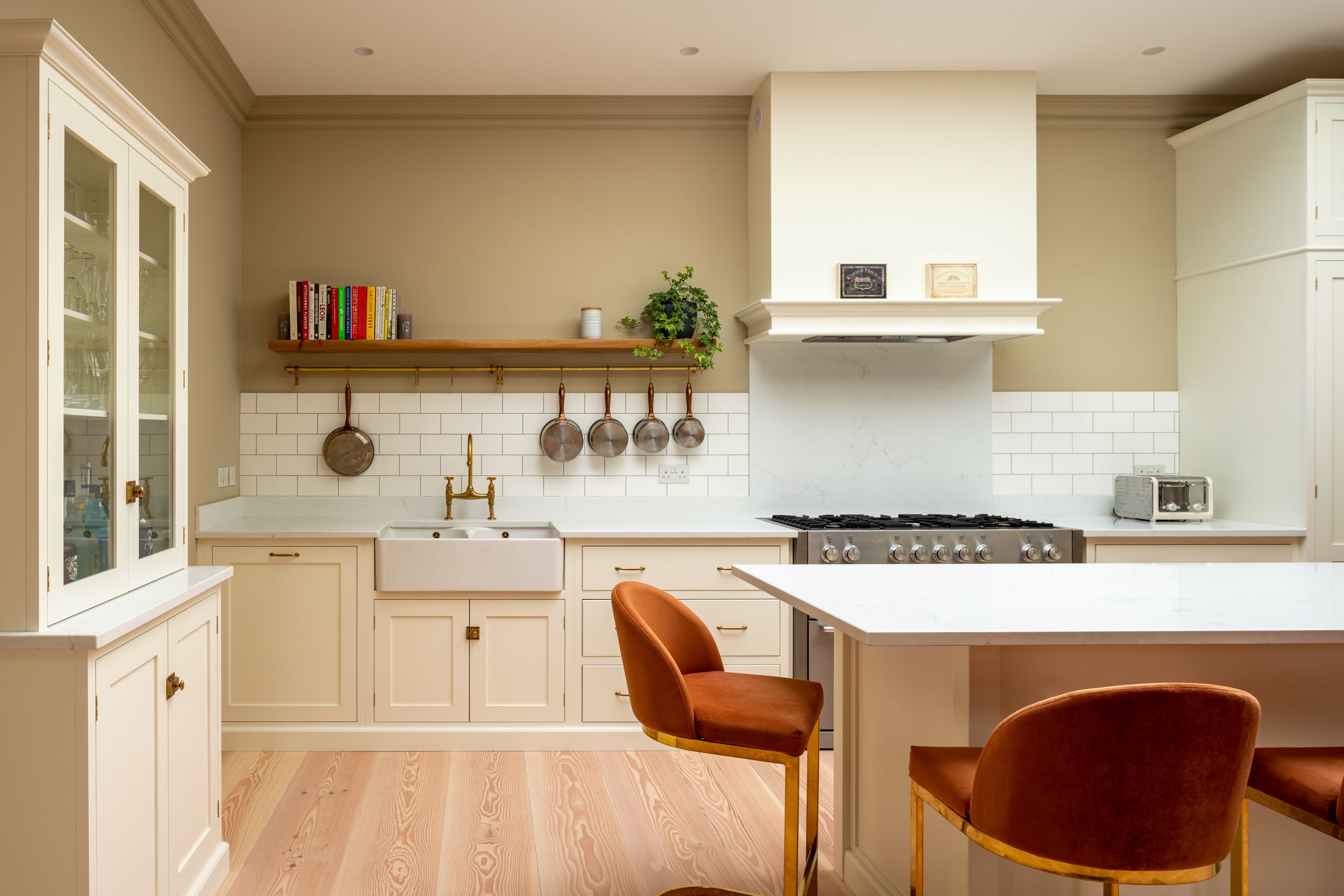 Image may contain: Indoors, Interior Design, Kitchen, Plant, Chair, Furniture, Sink, Cooktop, and Kitchen Island