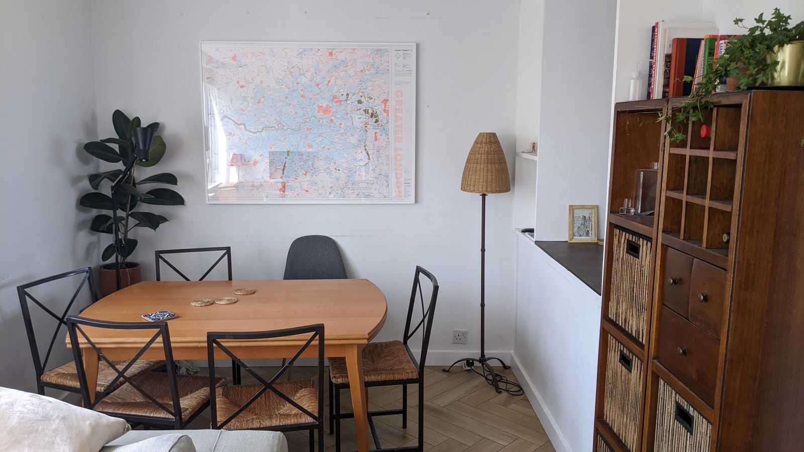 Image may contain Furniture Table Architecture Building Dining Room Dining Table Indoors Room Plant Lamp and Chair