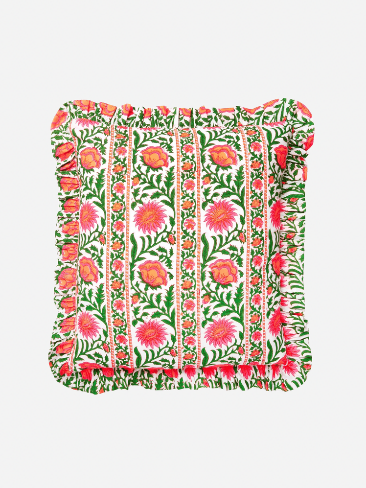 Image may contain: Cushion, Home Decor, Pillow, Clothing, Skirt, and Pattern