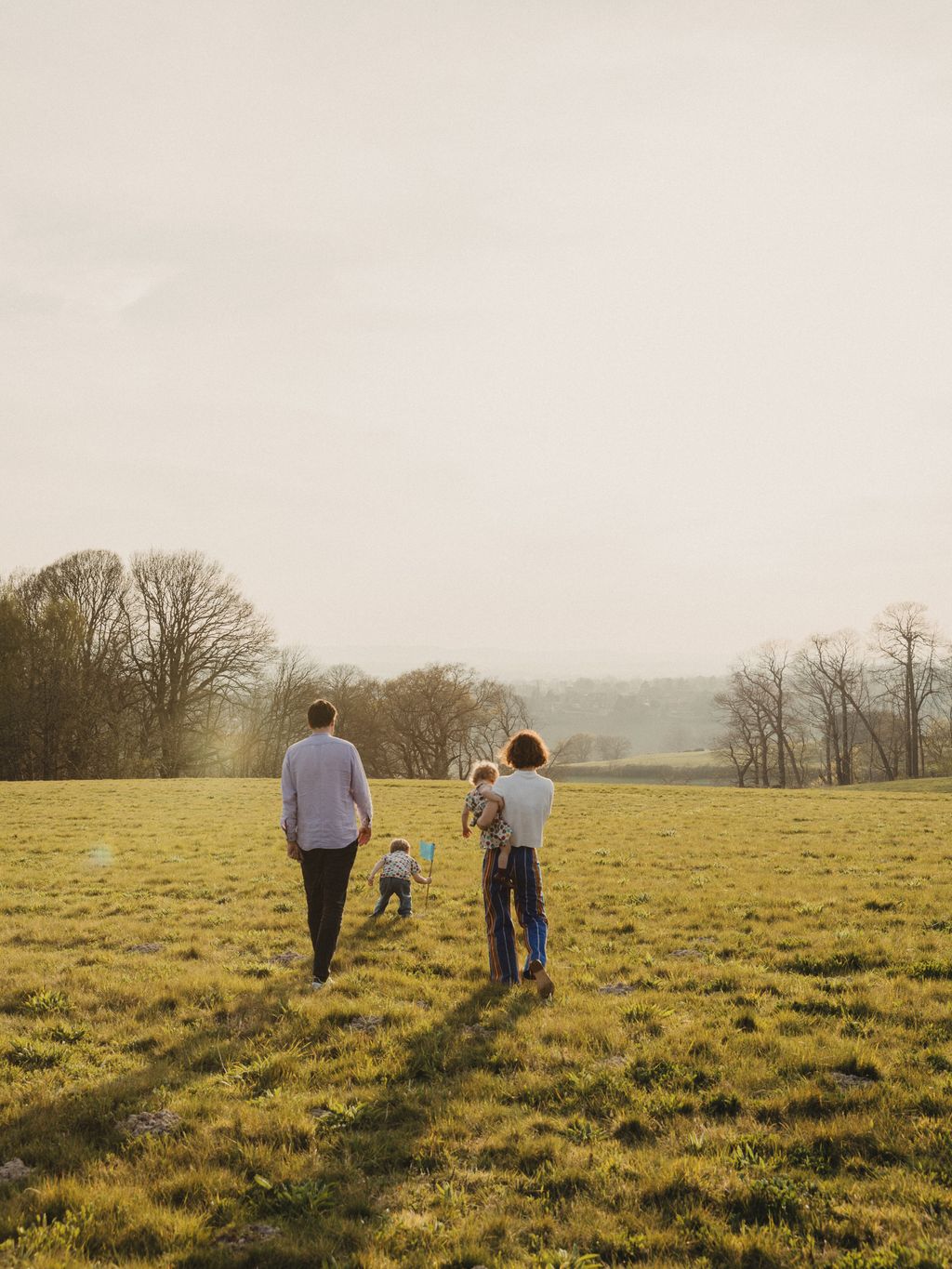Image may contain Person Walking Grass Plant Nature Outdoors Park Vegetation Field Grassland Face and Head