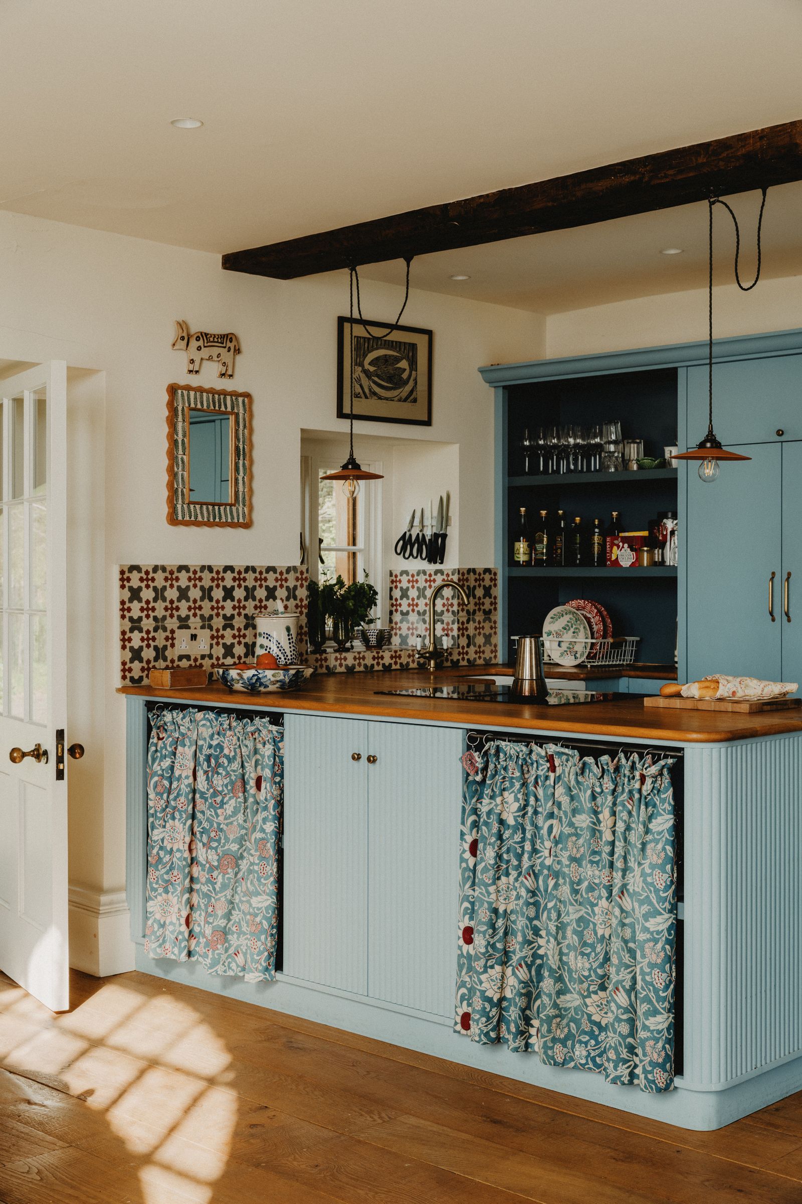 Image may contain Indoors Interior Design Lamp Kitchen Art Painting Box Plate Sink Sink Faucet and Home Decor