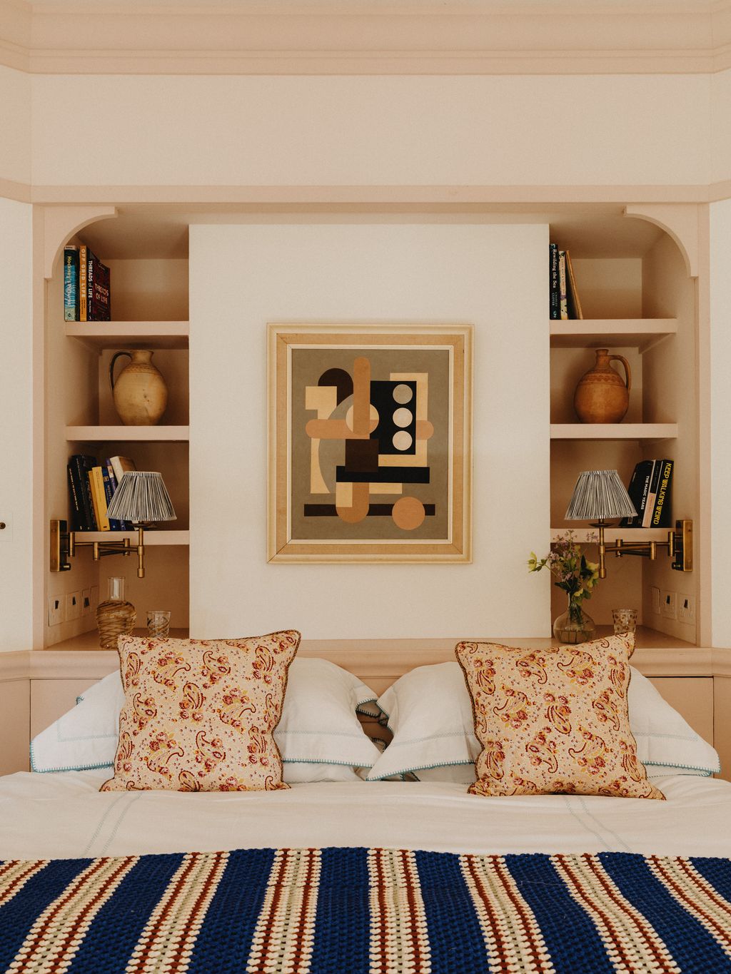 Image may contain Cushion Home Decor Art Painting Furniture Indoors Interior Design Pillow Cup Bed and Lamp