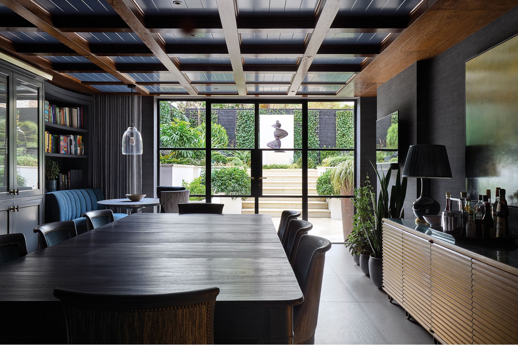 Image may contain: Indoors, Interior Design, Lamp, Architecture, Building, Dining Room, Dining Table, Furniture, and Room