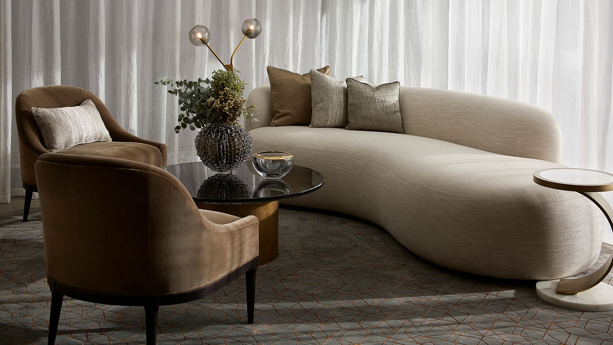 Image may contain: Furniture, Couch, Table, Chair, Home Decor, Coffee Table, and Plant