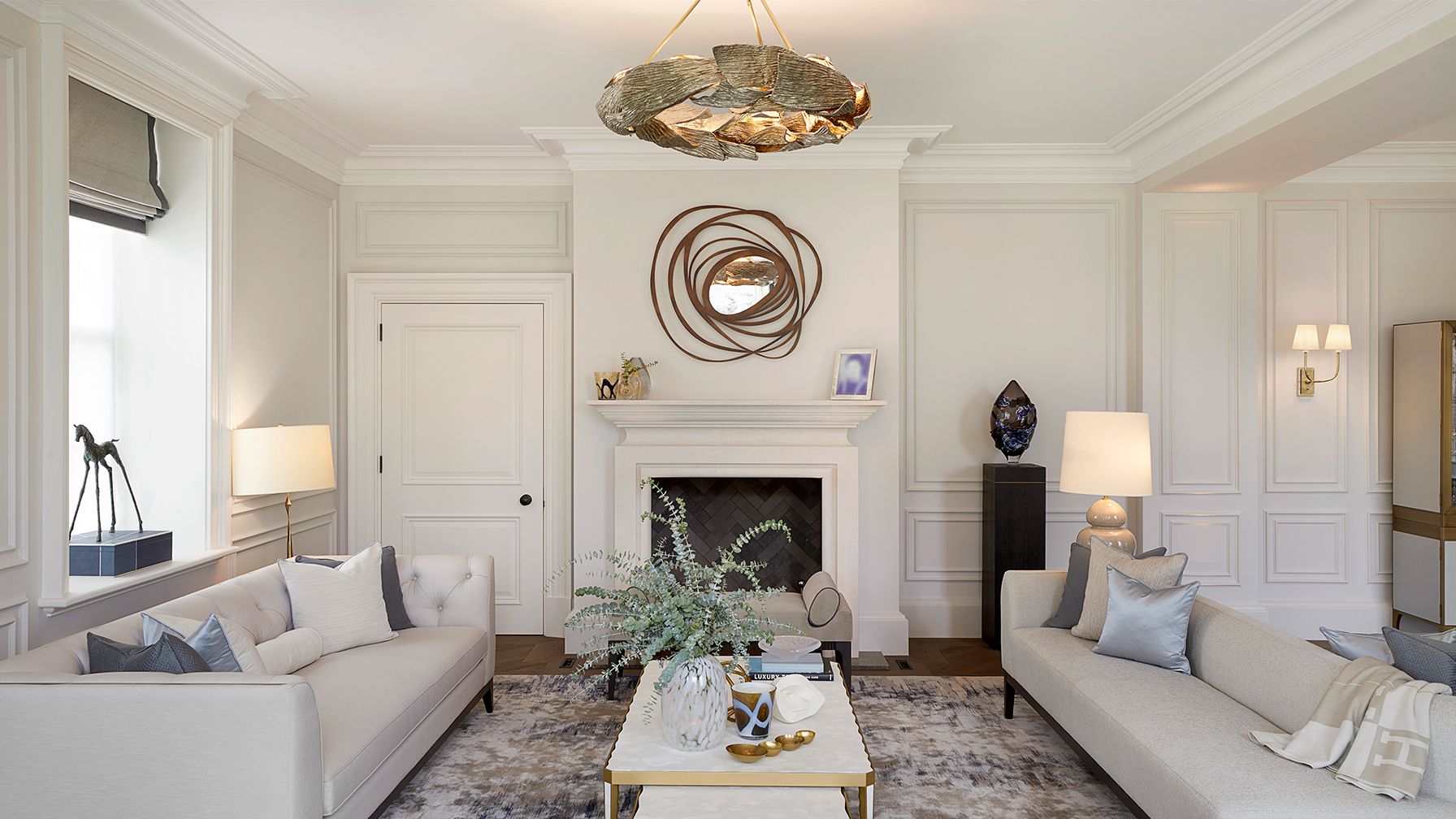 Image may contain: Home Decor, Lamp, Furniture, Table, Couch, Architecture, Building, Indoors, Living Room, and Room