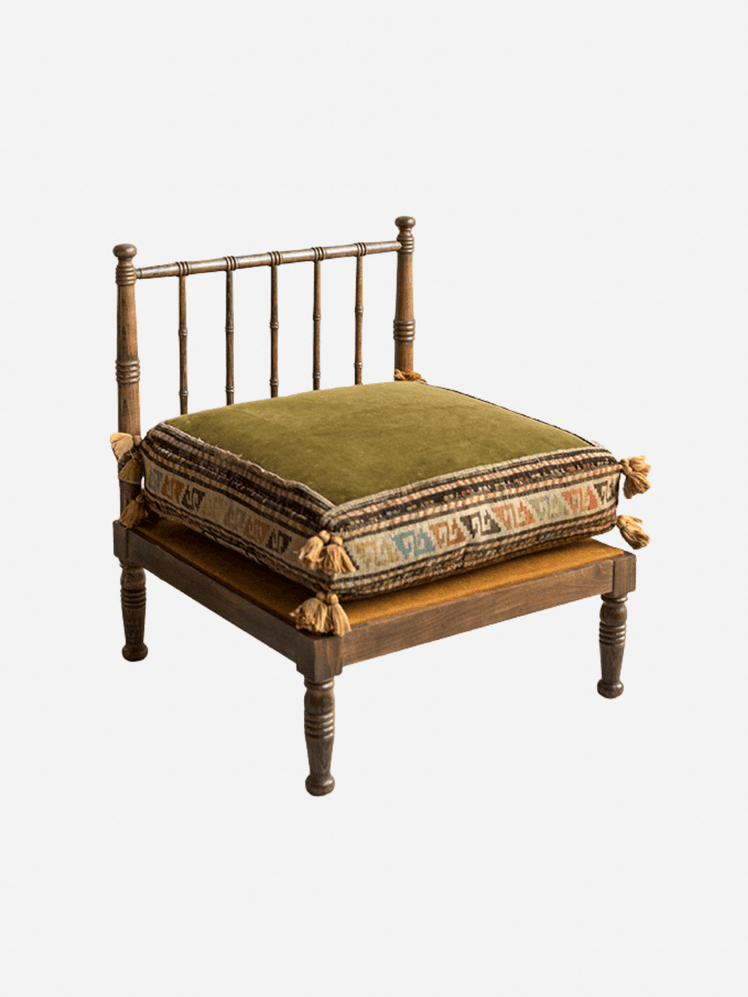 Image may contain: Cushion, Home Decor, Furniture, and Bed