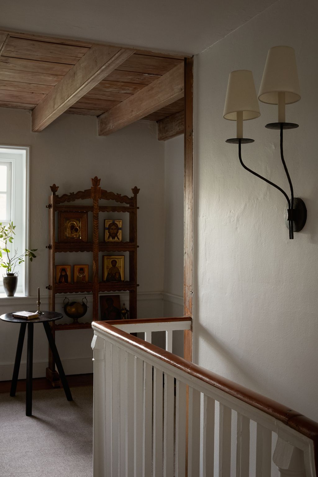 Image may contain Indoors Interior Design Book Publication Wood Plant Lamp Architecture Building House and Housing