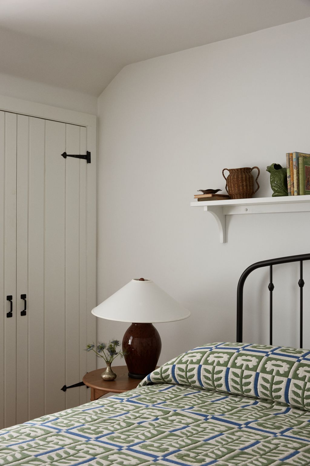 Image may contain Lamp Indoors Interior Design Table Lamp Bed Furniture Cushion Home Decor Bedroom and Room