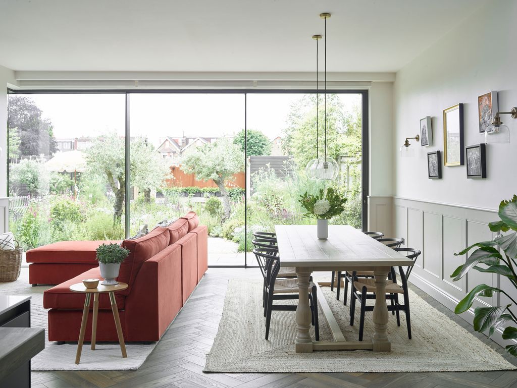 Image may contain Architecture Building Dining Room Dining Table Furniture Indoors Room Table and Home Decor