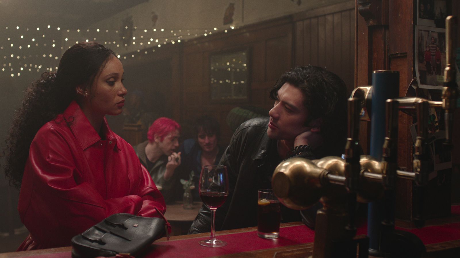 Image may contain Will Sharpe Hannah Davis John Dwyer Alcohol Bar Bar Counter Beverage Pub Cup Adult and Person